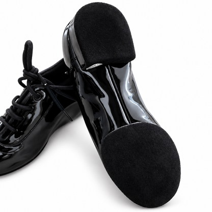 Black patent lace-up ballroom dance shoes for Juvenile boys on a white background. Leather. Latine. 